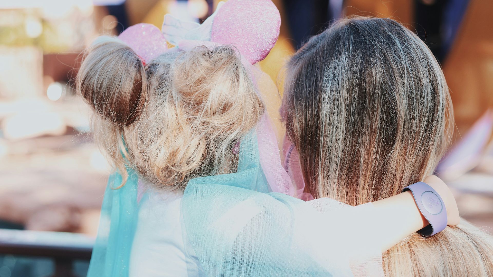 woman carrying a girl