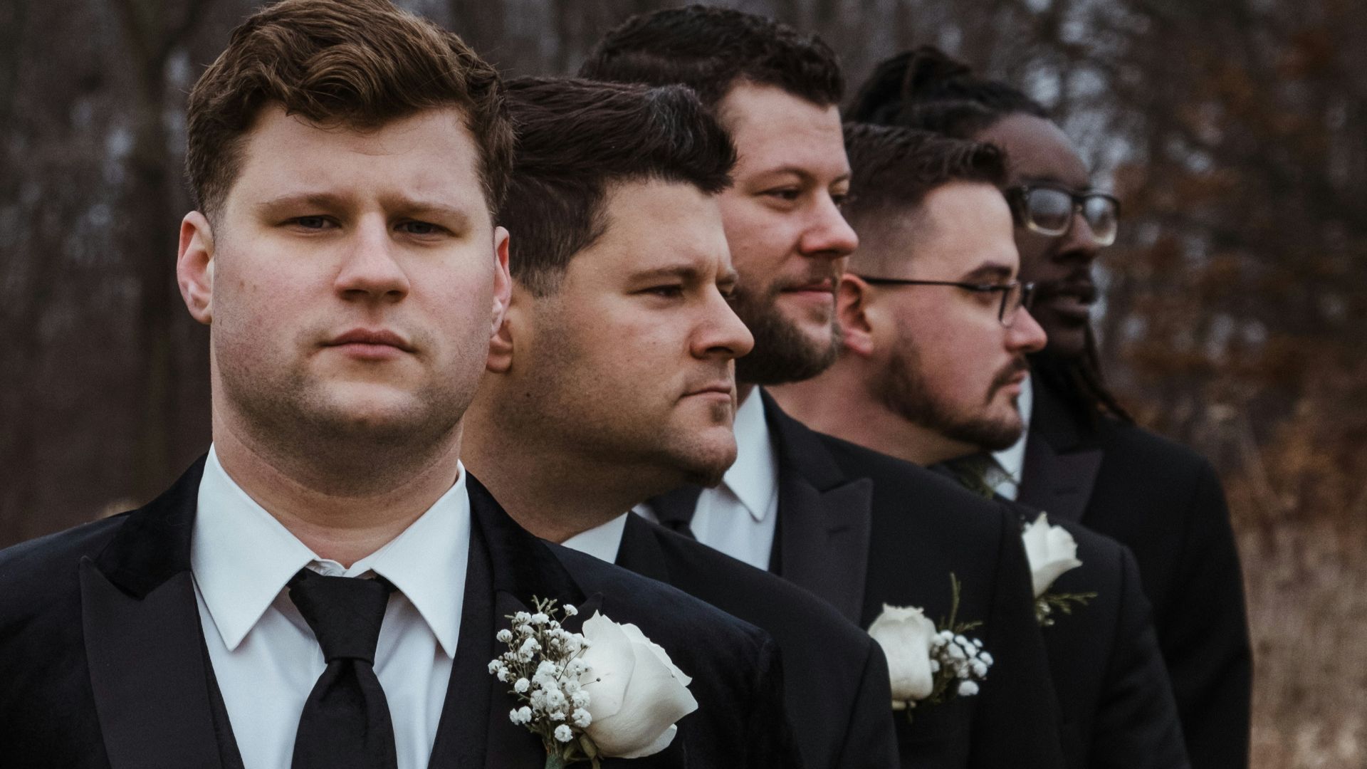 a group of men standing next to each other