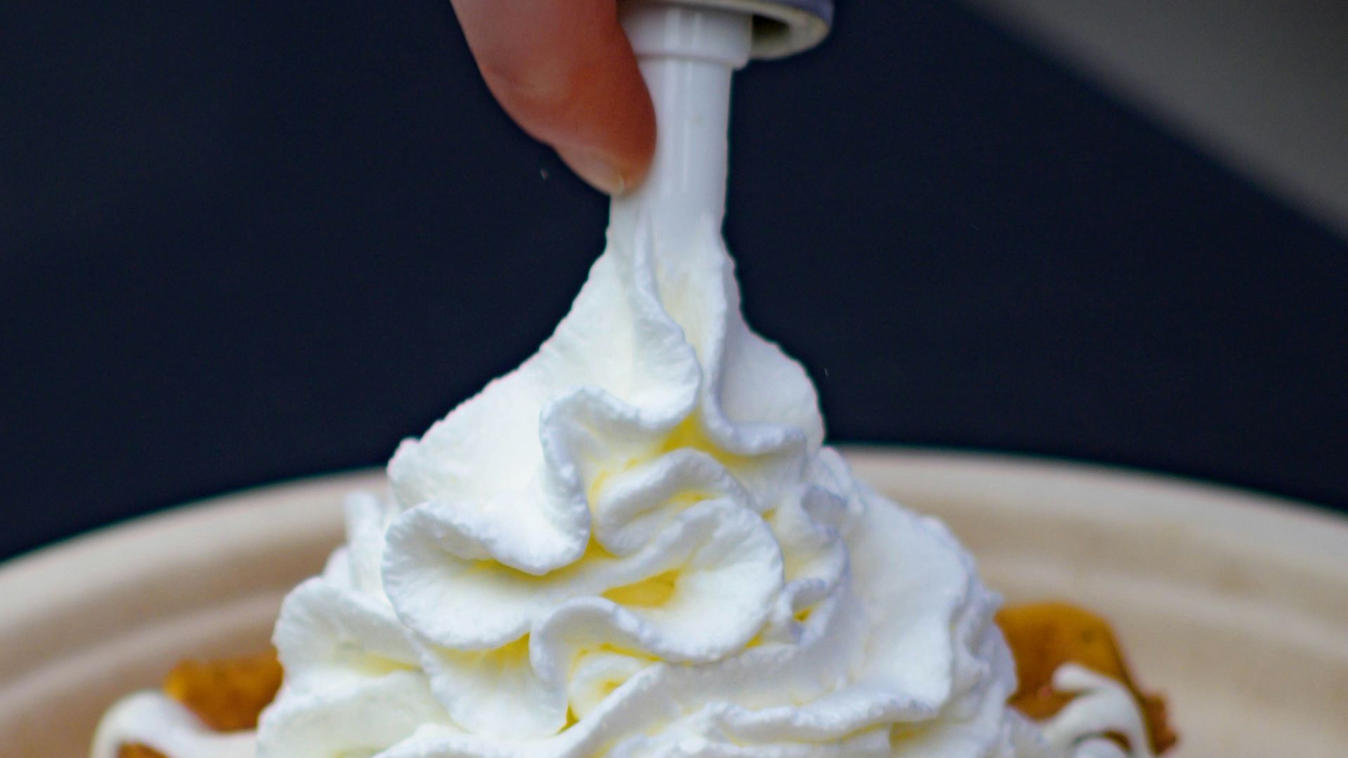 white icing on brown cake