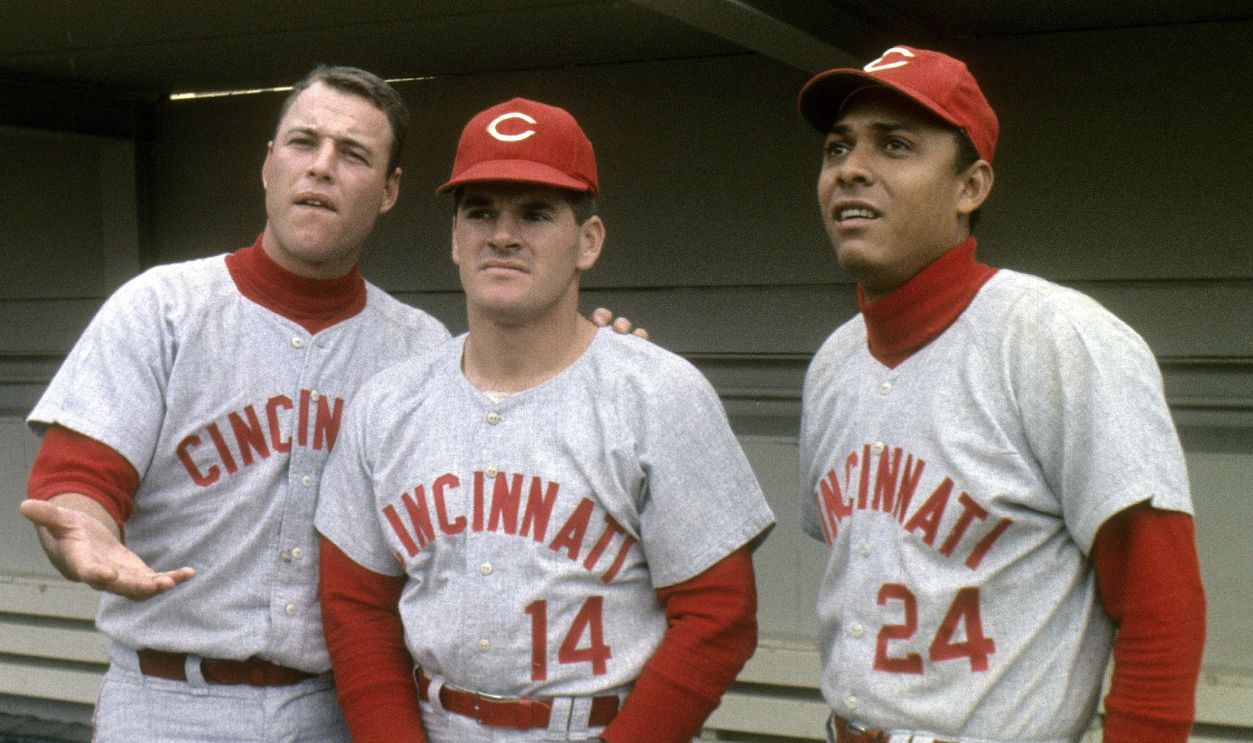 First Baseman Tony Perez #24 and Pete Rose #14 of the Cincinnati Reds standing in the dougout before a Major League Baseball game circa 1960's. Perez played for the Reds from 1964-76 and 1984-86.