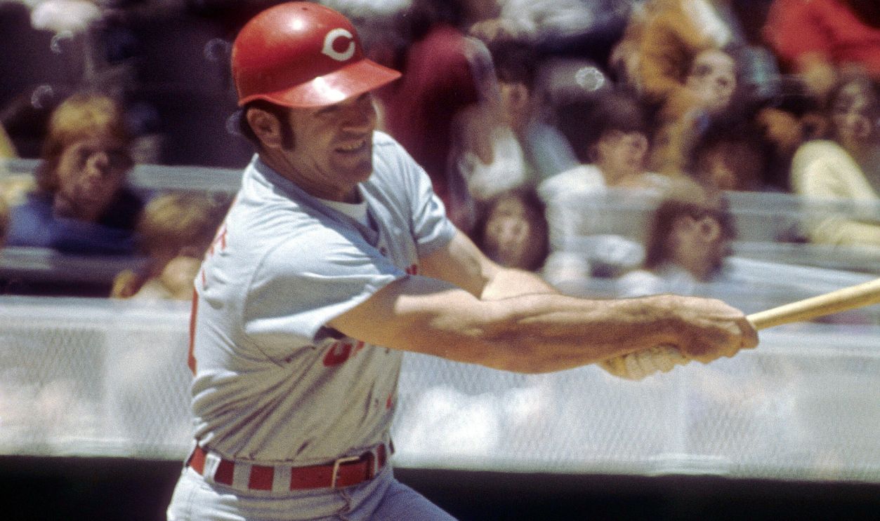 Infielder Pete Rose #14 of the Cincinnati Reds swings at a pitch and watches the flight of his ball during a MLB baseball game circa mid 1960's. Rose Played for the Reds from 1963-78.