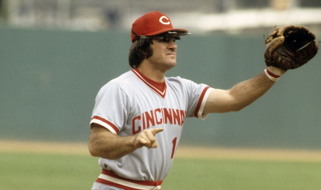 CIRCA 1970's: Outfielder Pete Rose #14 of the Cincinnati Reds in action at thirdbase against the New York Mets during a MLB baseball game circa mid 1970's at Shea Stadium in Flushing, New York. Rose Played for the Reds from 1963-78.
