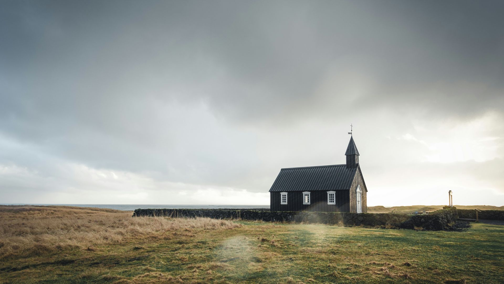 church surrounded by grass