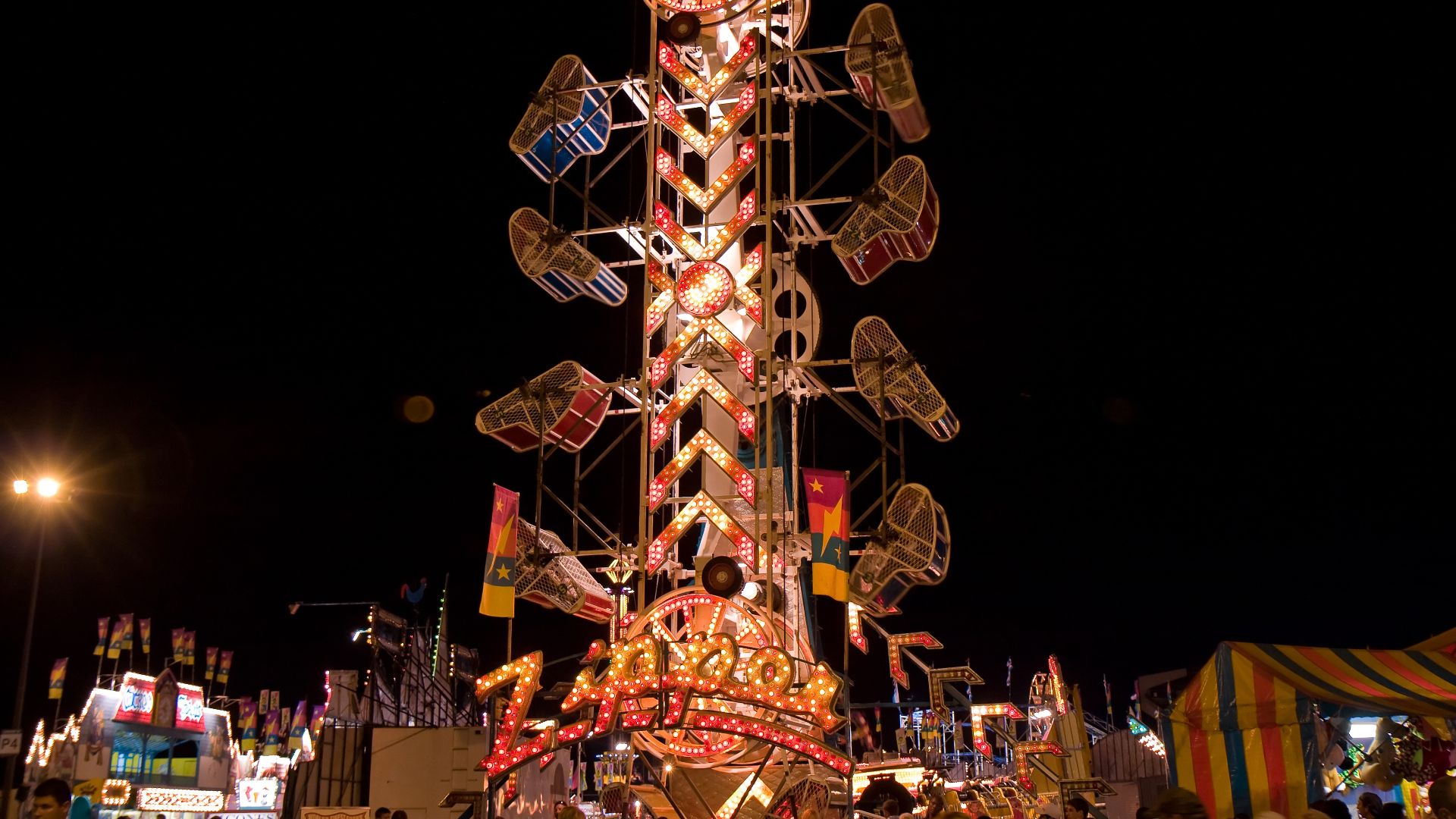 File:Zipper ride lit up at night.jpg