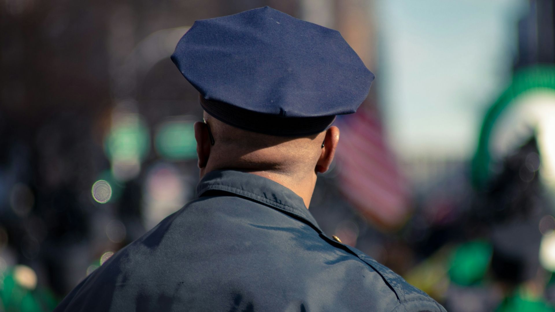 man wearing police uniform selective focus photo