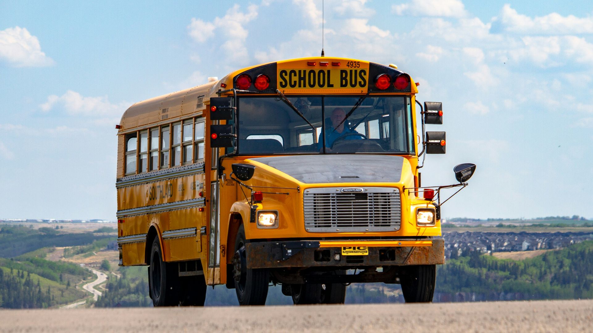 school bus on pathway