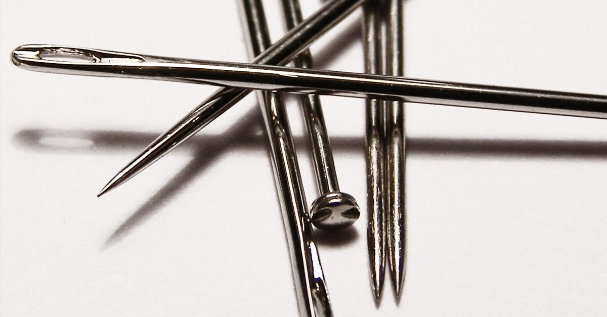 Some have a head without an eye, the others, an eye without a head. You may find the answer if you try; and when all is said, half the answer hangs upon a thread. What are they?