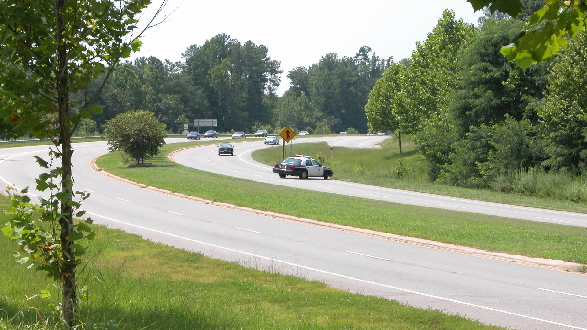 File:2003-07 Police cruiser giving chase.jpg