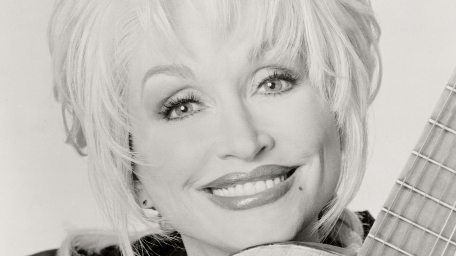 File:Dolly Parton with guitar.jpg
