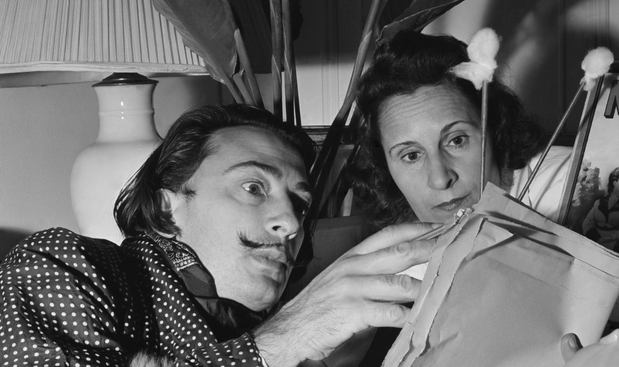 Salvador Dali Looking Over Sketch