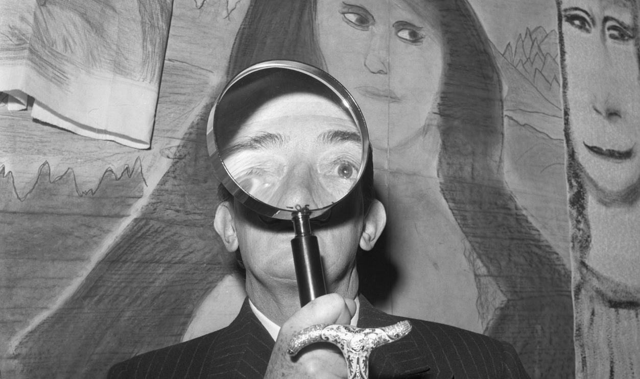 Salvador Dali Looking Through a Magnifying Glass with Amateur Mona Lisa's
