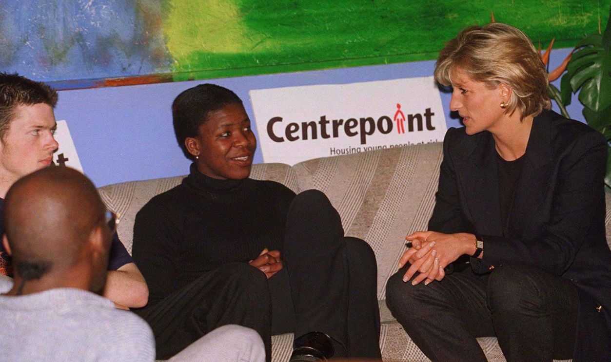 Princess Diana as Patron of Centrepoint charity for homeless people talks with young homeless people at a Centrepoint homeless hostel during her visit to the centre on March 10, 1997 in London, England. 
