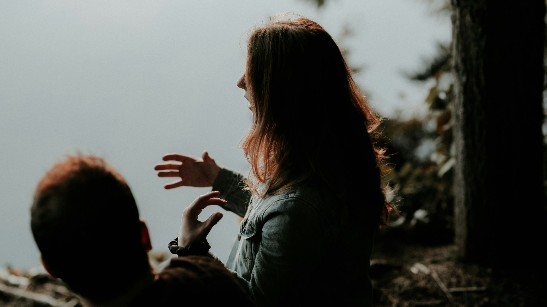 woman wearing gray jacket