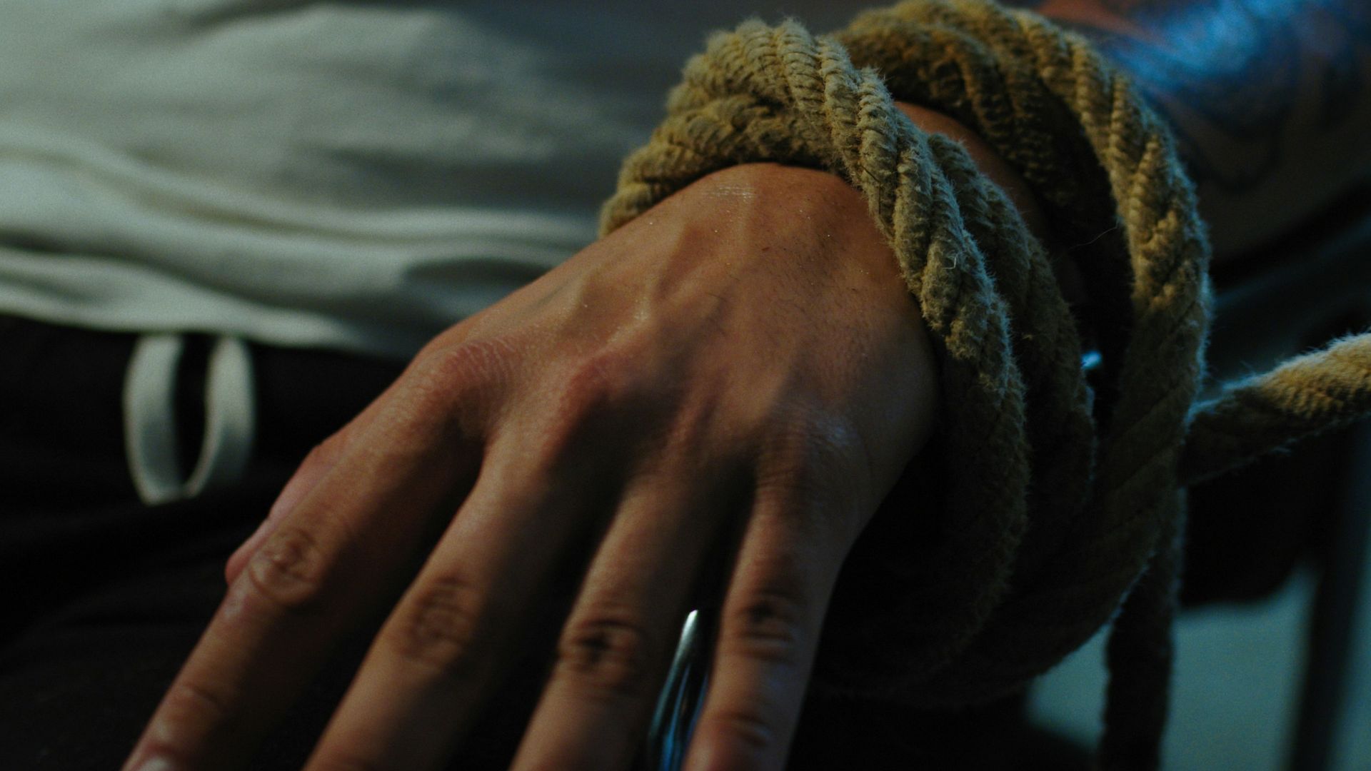 person wearing silver ring and silver ring