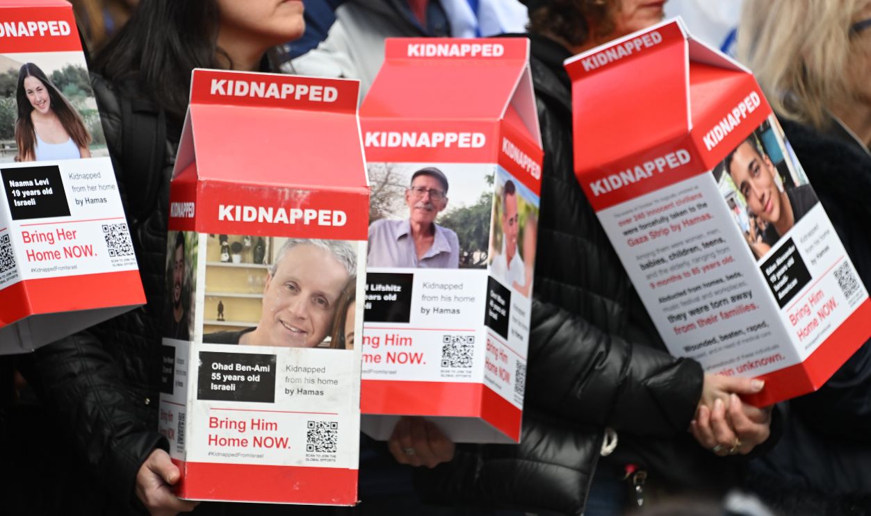 Gettyimage - 2078450437, Demonstrators Rally In Central Park To Mark 150 Days Since Hostages Were Taken In Attack On Israel NEW YORK, NEW YORK - MARCH 10: Demonstrators hold milk cartons with photos of kidnapped Israelis during a rally in Central Park marking 150 days since hostages were taken in attack on Israel on March 10, 2024 in New York City.
