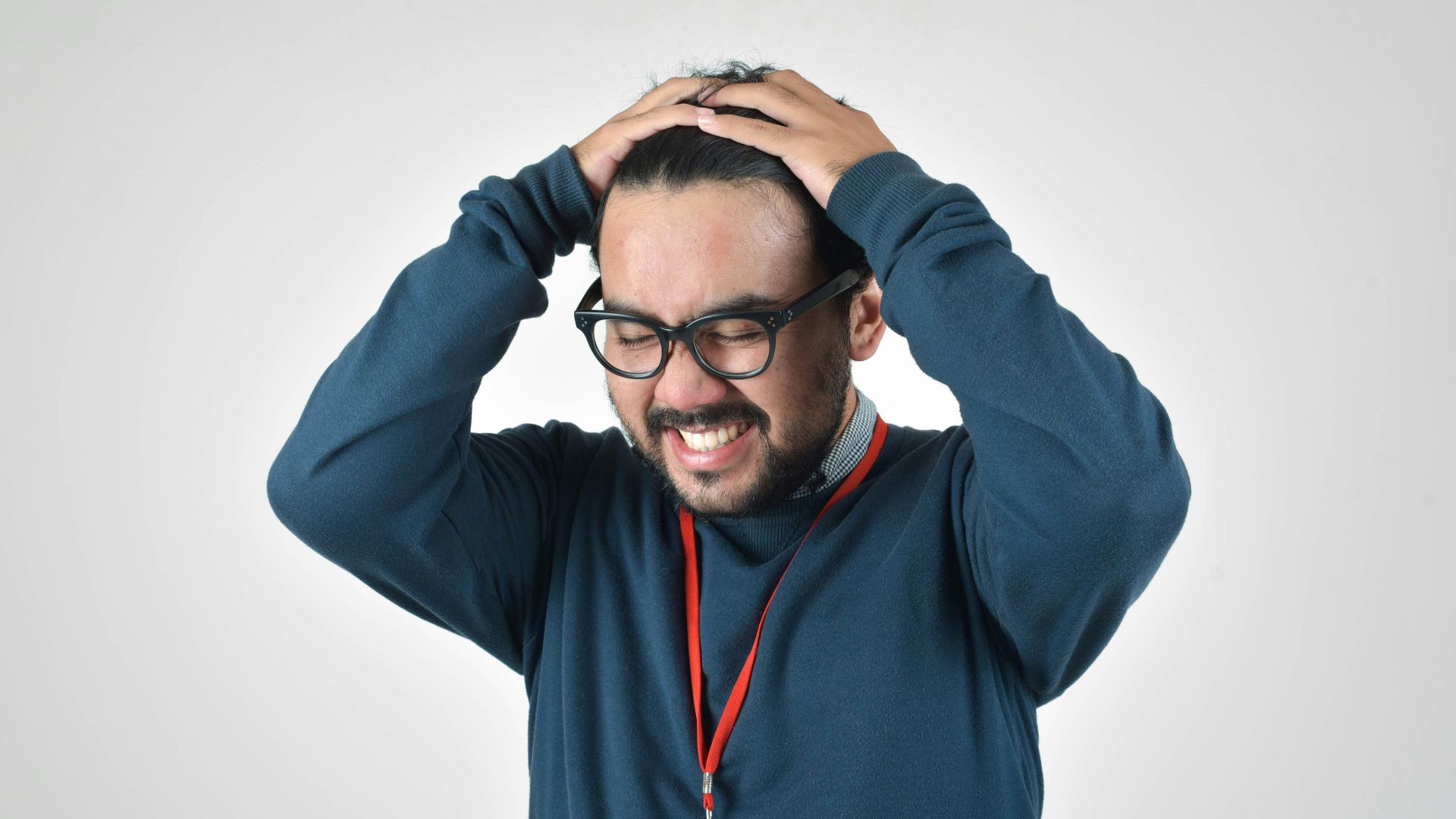 man in bluee ssweater