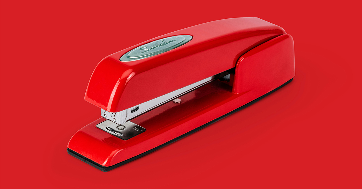 With pointed fangs it sits in wait, With piercing force it doles out fate, over bloodless victims proclaiming its might, eternally joining in a single bite. What is it?