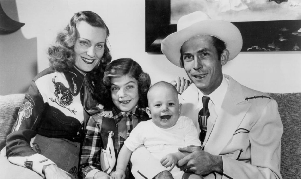The Williams family Left to Right Audrey Williams, Lycretia Williams, Hank Williams Jr and Hank Williams Sr pose for a portrait in 1949 in Nashville Tennessee.