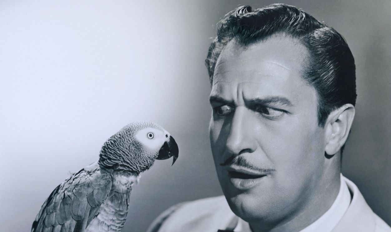 Gettyimages - 526885566, Actor Vincent Price Holding a Parrot 