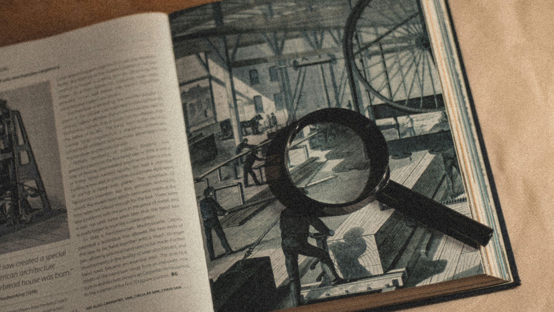 an open book with a magnifying glass on top of it