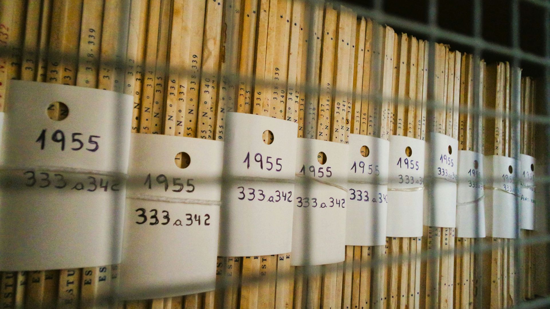 a group of white signs on a metal rack