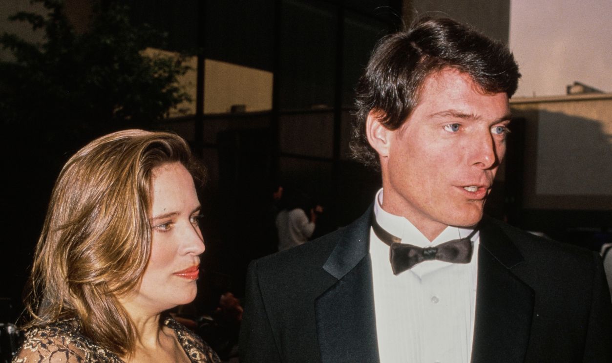 American actress and singer Dana Morosini, wearing a sheer gold evening wrap over a black dress, and her partner, American actor Christopher Reeve, who wears a tuxedo and bow tie, attend the 16th People's Choice Awards at Universal Studios in the Universal City neighbourhood of Los Angeles, California, 11th March 1990. 
