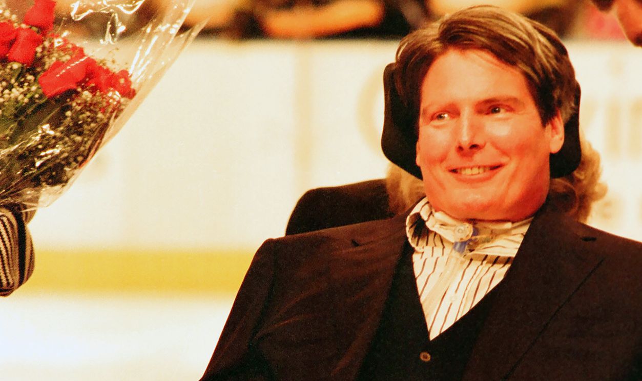  Christopher Reeve is presented with a $50,000 check for the Christopher Reeve Foundation by IBM and The New York Rangers as part of the IBM Power Play Program before the game between the Boston Bruins vs The New York Rangers at Madison Square Garden on April 3, 1997 in New York City