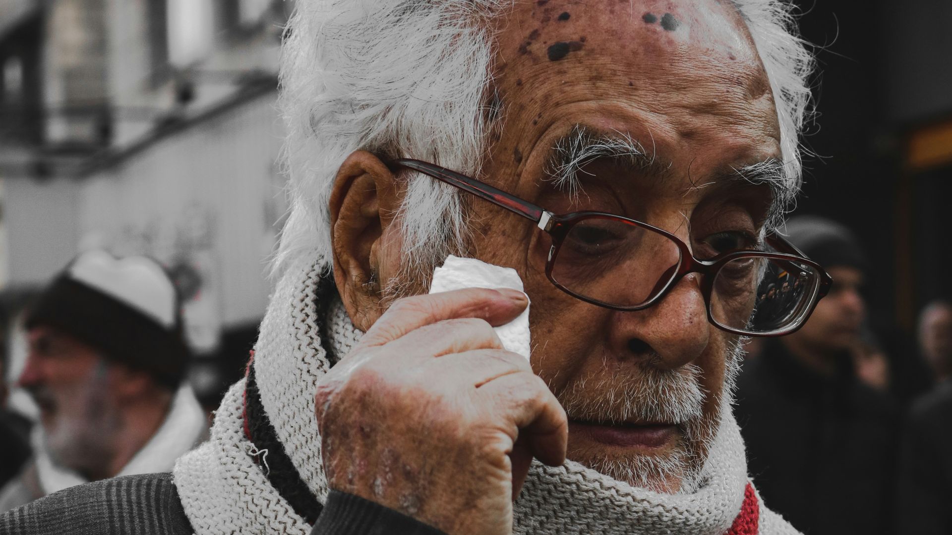 woman in black blazer wearing eyeglasses