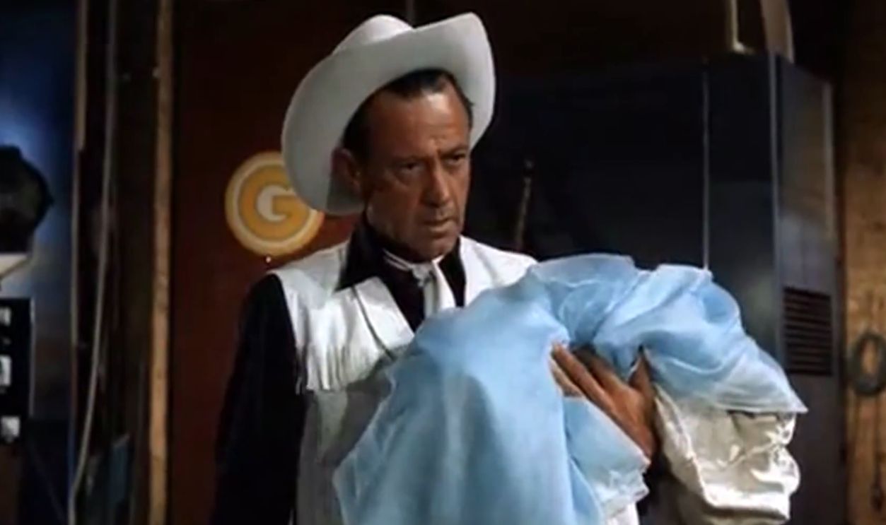 Screenshot from Paris When It Sizzles (1964)