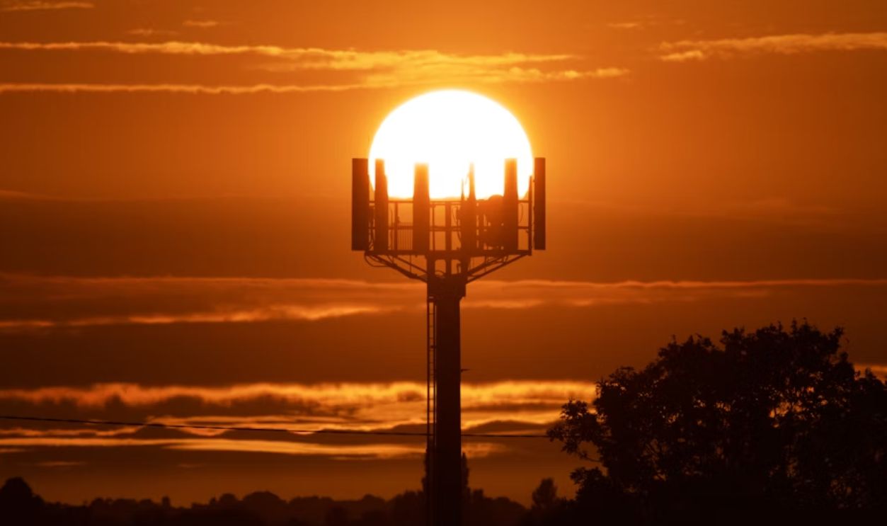 Sun Setting Behind Tower