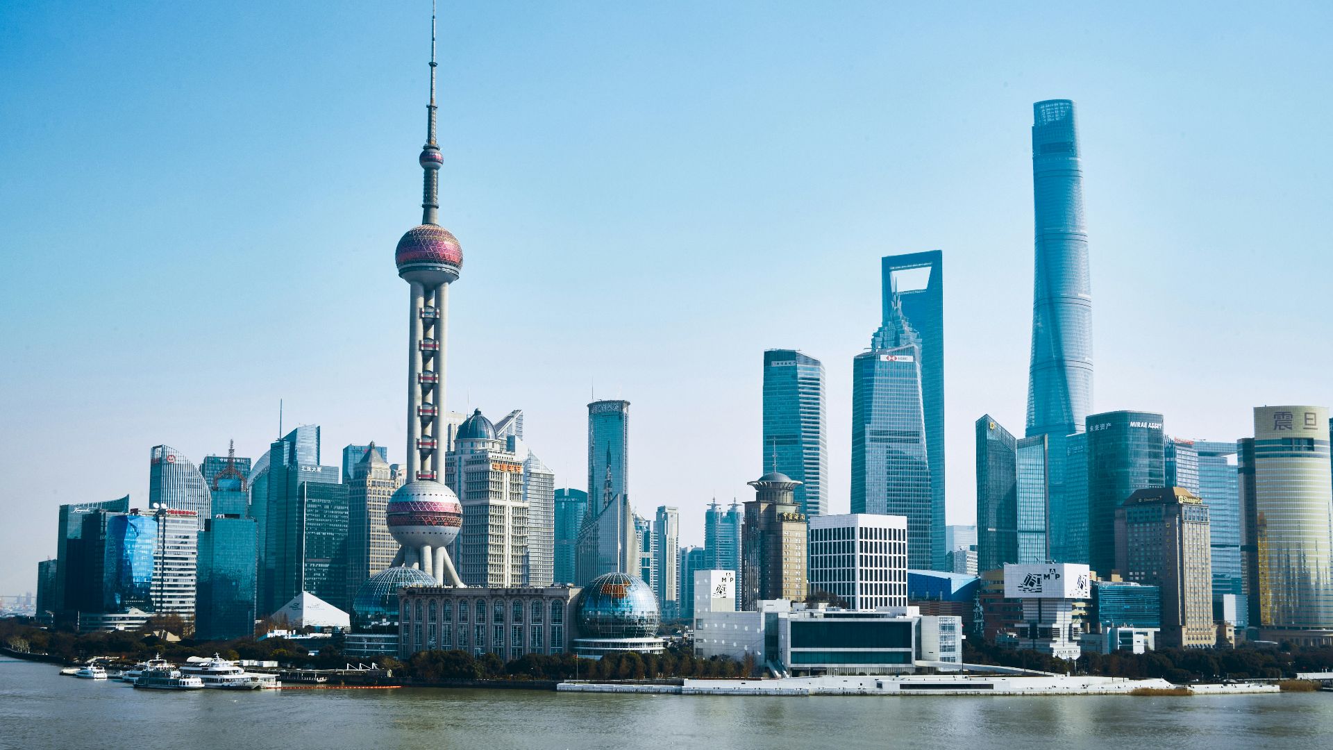 a view of a large city with tall buildings