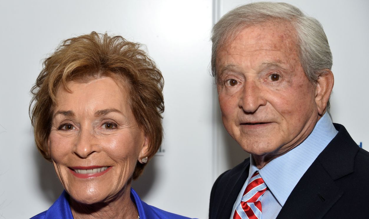The Honorable Judy Sheindlin (L) and her husband Jerry Sheindlin arrive at the Women's Guild Cedars-Sinai's Annual Luncheon at the Regent Beverly Wilshire Hotel on April 13, 2015 in Beverly Hills, California.