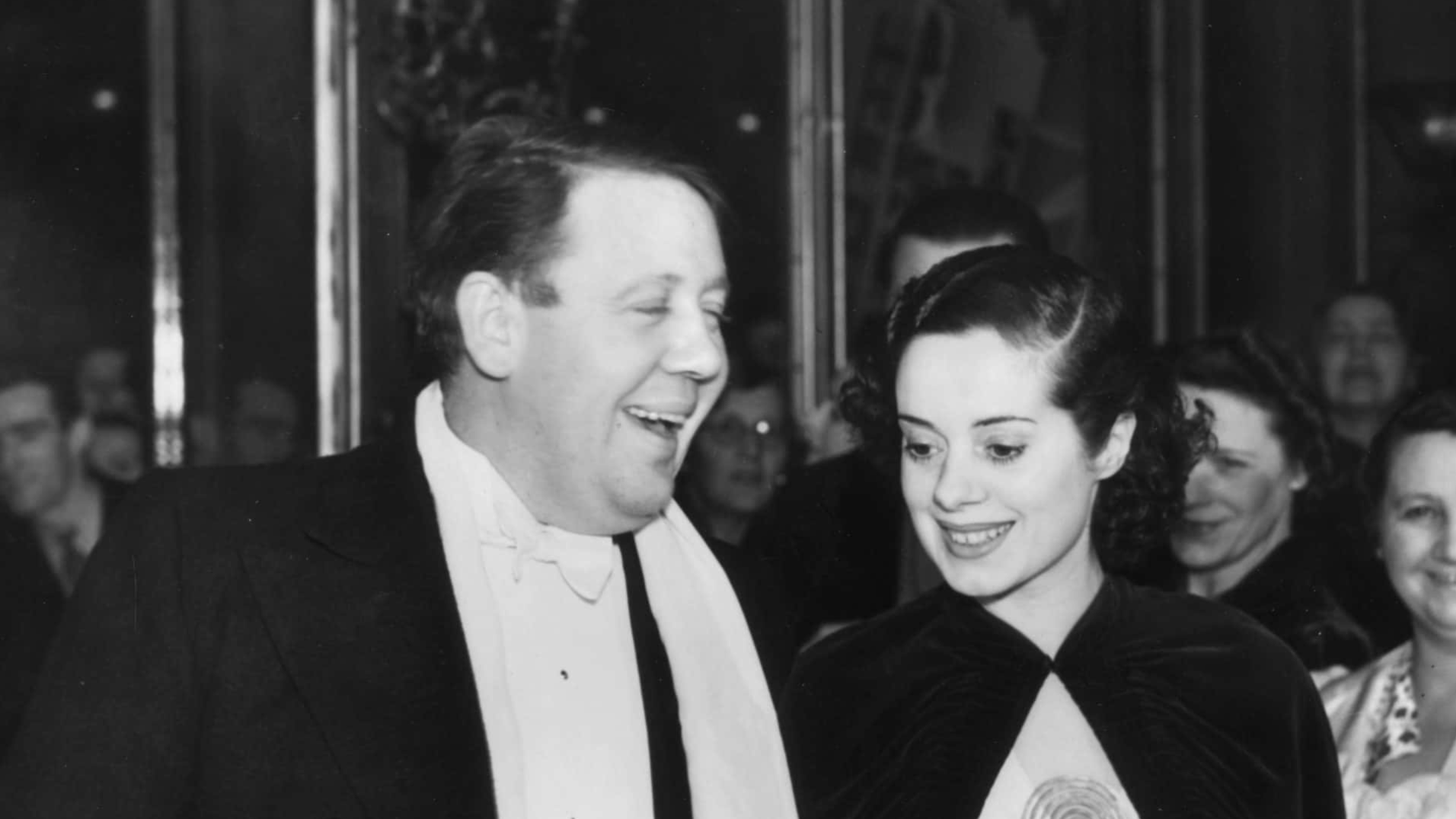 British actor, Charles Laughton (1899 - 1962) arrives with his actress wife, Elsa Lanchester (1902 - 1986) at the film premiere of 'Vessel of Wrath', aka 'The Beachcomber' at the Regal in Marble Arch, London.
