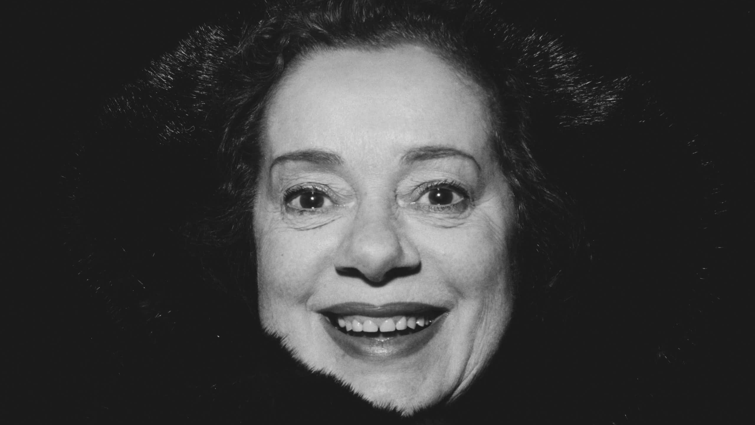 English actress Elsa Lanchester (1902 - 1986) at Heathrow Airport, London, UK, 1st February 1963.