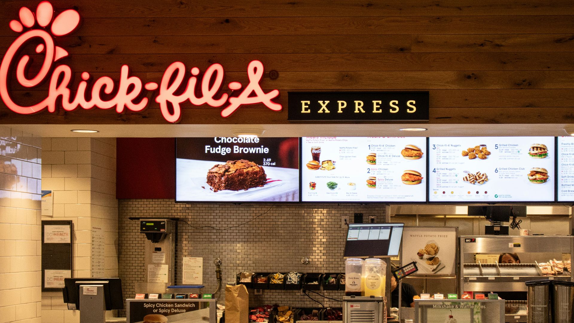 a fast food restaurant with a large menu