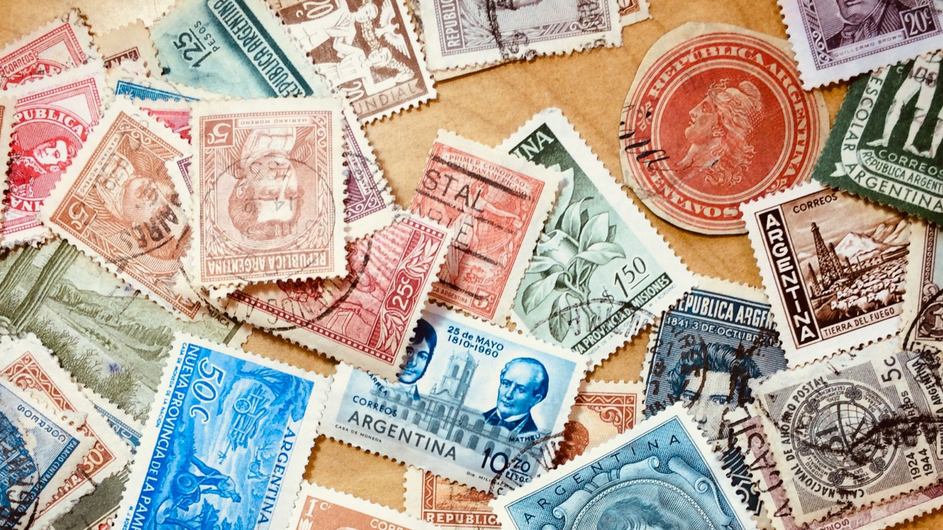 assorted coins on brown wooden table