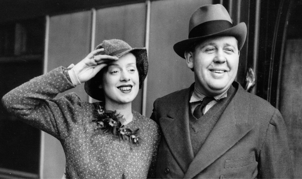 British actor and director Charles Laughton and his wife Elsa Lanchester (british actress). Waterloo station/London. March 3th 1934.