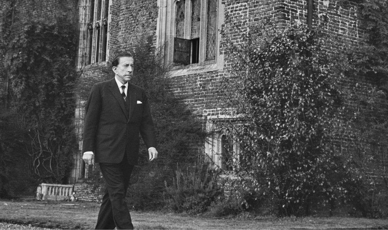 Billionaire industrialist J Paul Getty (1892 - 1976) walking in the grounds of his Sutton Place estate near Guildford in Surrey, which he has just purchased from the Duke of Sutherland, on October 16th, 1959. 