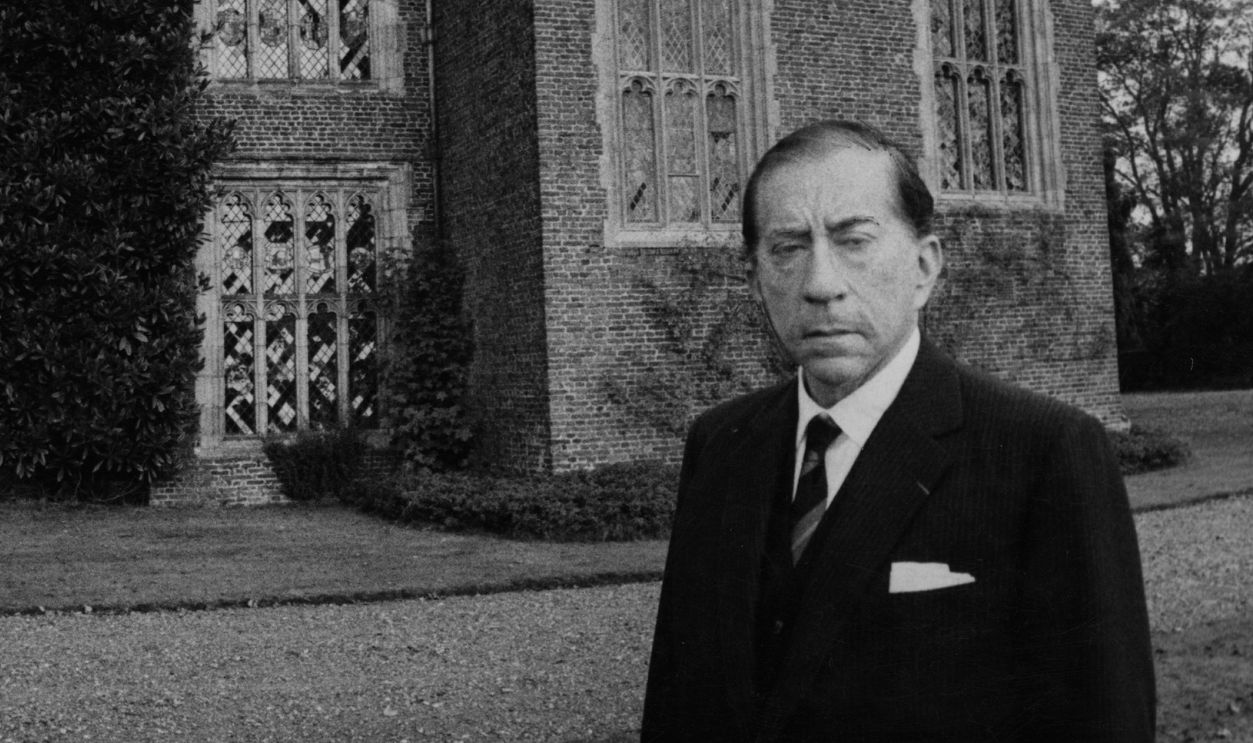 American industrialist J. Paul Getty (1892 - 1976) outside Sutton Place, his Tudor manor house in Surrey, 16th October 1959. He has just purchased the house from the Duke of Sutherland. 