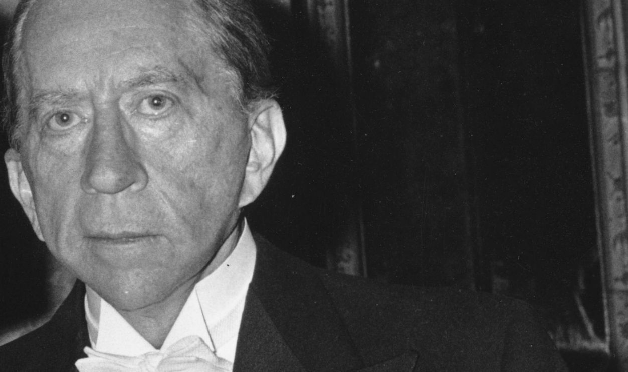 American oil executive and financier J. Paul Getty (1892 - 1976) with Mary Teissier at a party at his home Sutton Place, Surrey. 