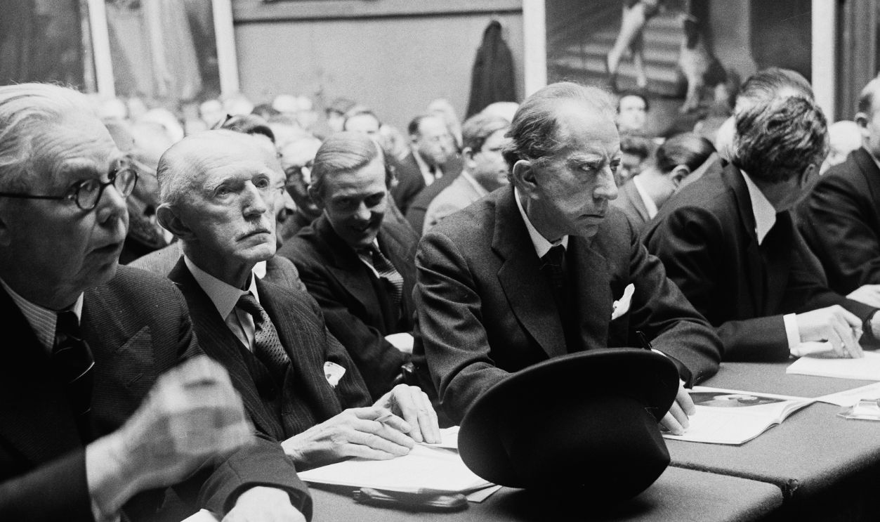John Paul Getty (1892-1976), third from left, at a Sotheby's fine art auction, London, March 23rd, 1960. 