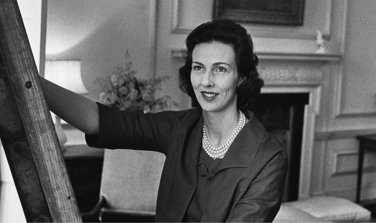 Interior decorator Penelope Kitson, one of J Paul Getty's female companions, preparing the billionaire industrialist's Sutton Place mansion in Surrey for a party on July 2nd, 1960. 