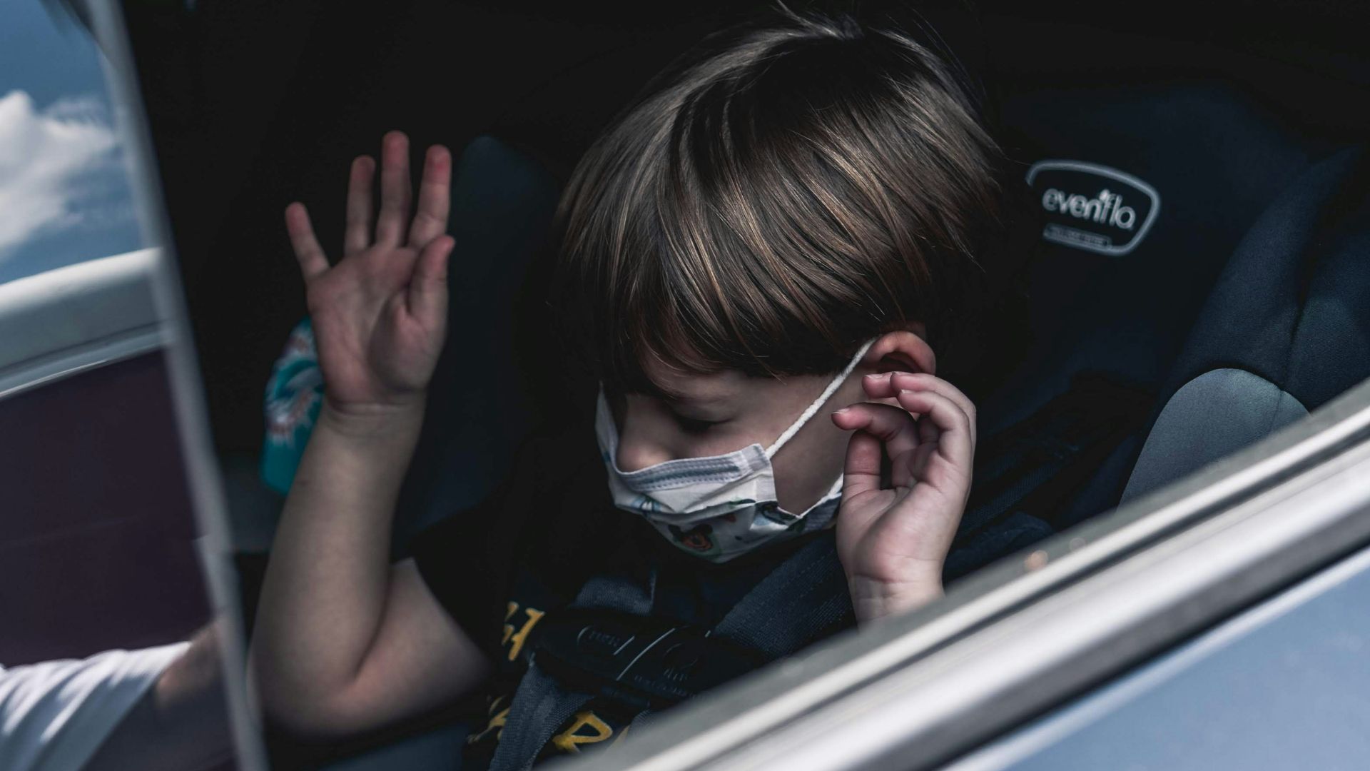 woman in white shirt wearing black sunglasses