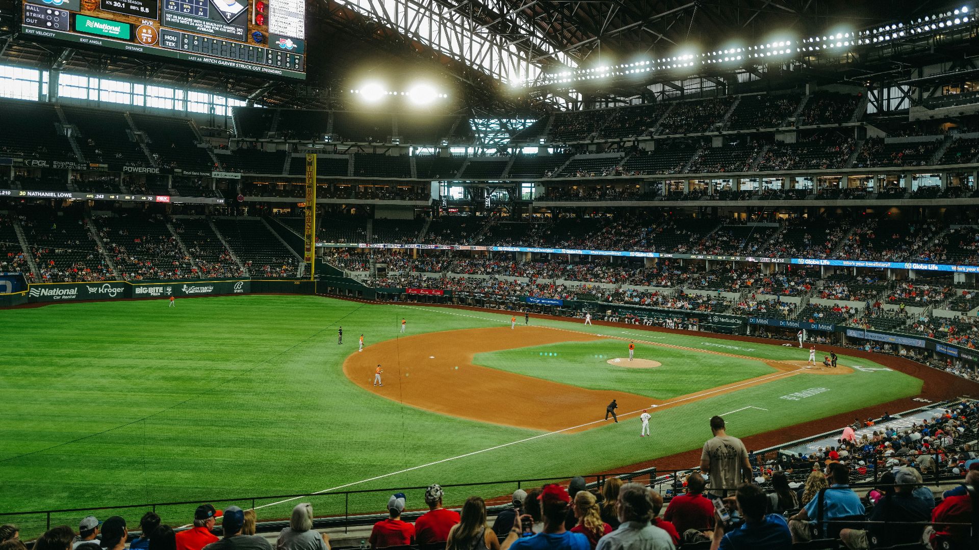 a baseball stadium with a full crowd