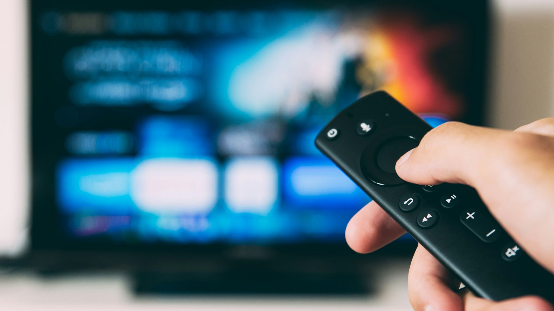 turned-on flat screen television