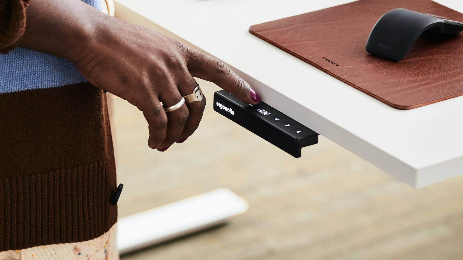 person holding black and silver box mod