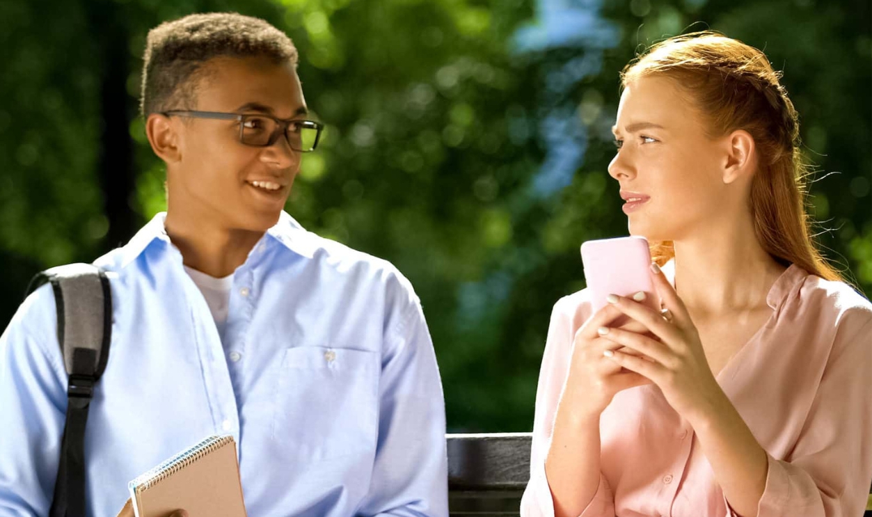 Mixed-Race Boy Trying To Get Acquainted With -Shutterstock 1539548774