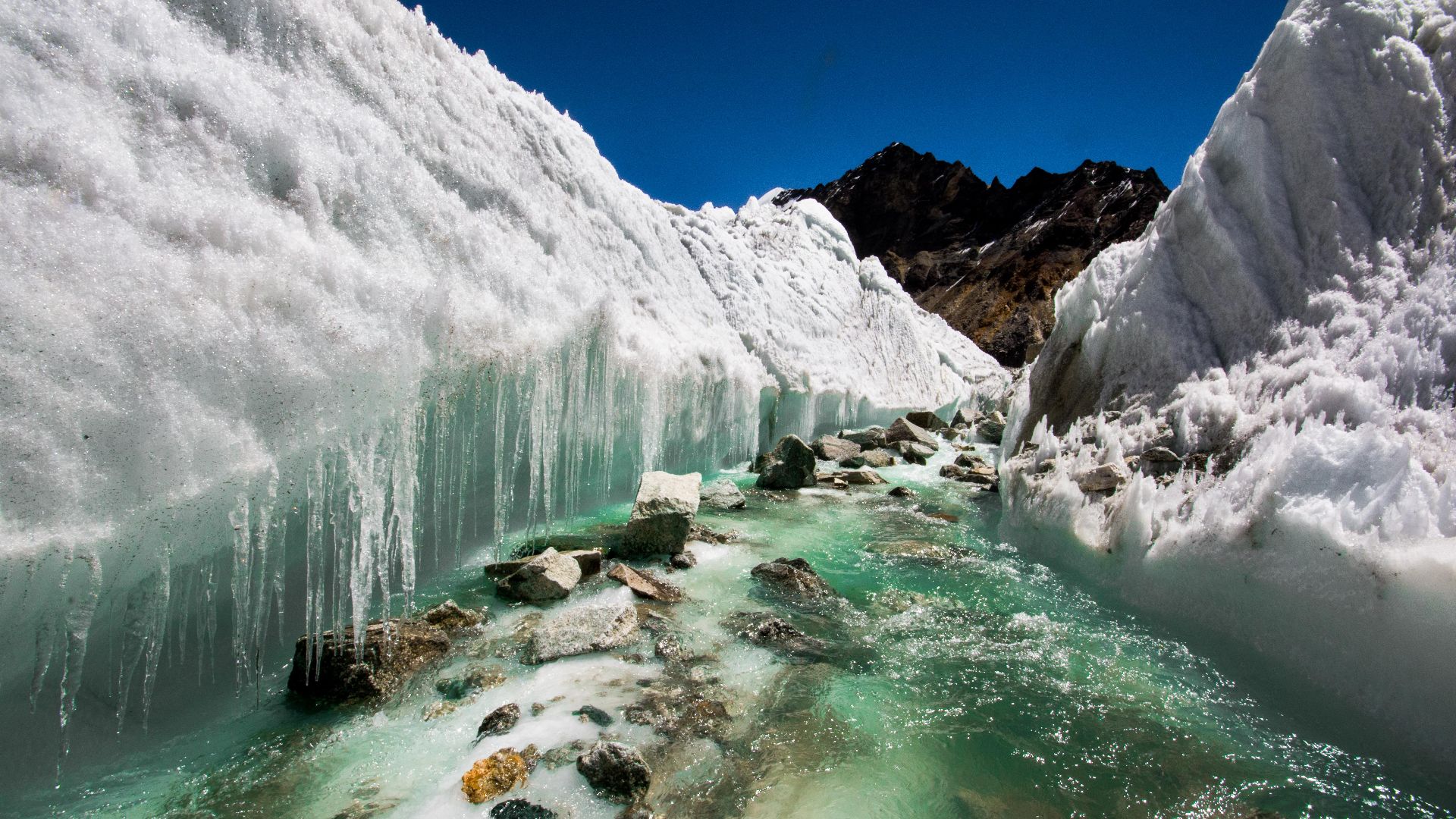 File:Glacial melt water carving the ice, river source Himalayas India.jpg