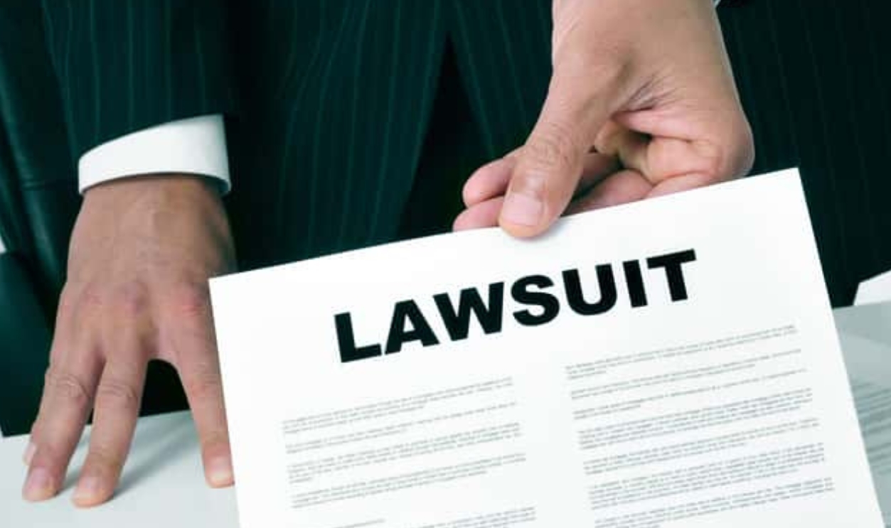 A Lawyer In His Office Showing A Document, Shutterstock, 189871757