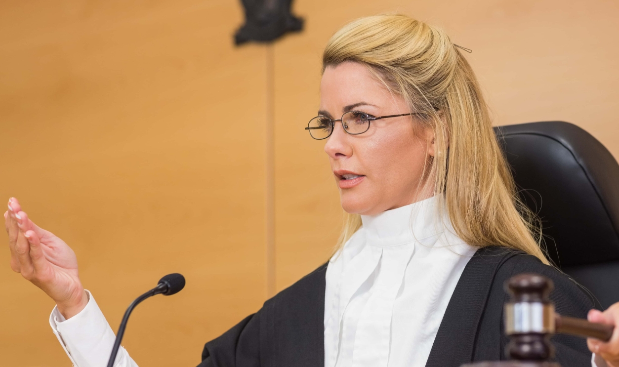 Stern Judge Speaking To The Court In The Court Room, Shutterstock, 244002769